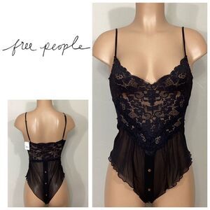 Free People black lace one piece bodysuit. XS. Retails $78
